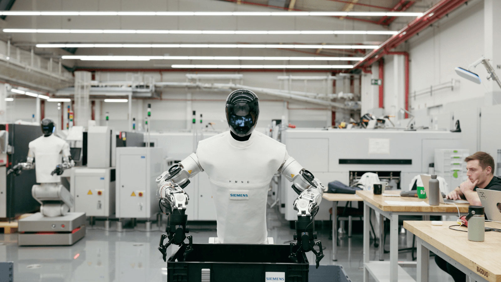Humanoid's HMND 01 Alpha on the shop floor at Siemens' Erlanger, Germany electronics manufacturing facility.