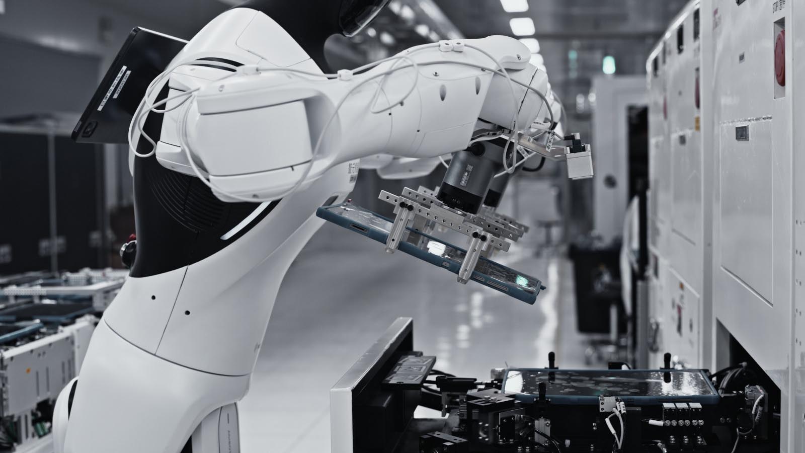 AgiBot G2 humanoid robot manufacturing tablets at Longcheer Technology
