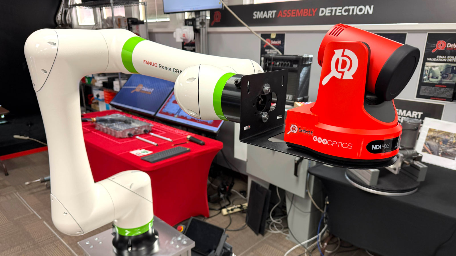 At Automate 2026 Booth #3921, visitors will see a robotic demonstration featuring a FANUC cobot with a mounted PTZOptics pan/tilt/zoom camera, showing attendees how cameras, robotics, industrial AI, and in-factory computers can solve highly challenging inspections in production environments.