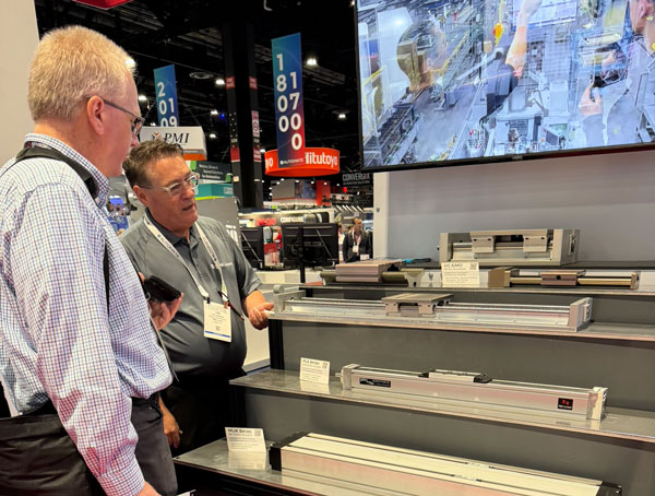Tom Ouellette, VP of Mechatronics (right), explaining to the the author how PBC Linear has grown from a supplier of simple linear components to more comprehensive systems, and how this has afforded him the opportunity to see and understand the wide variety of applications that use automation components.