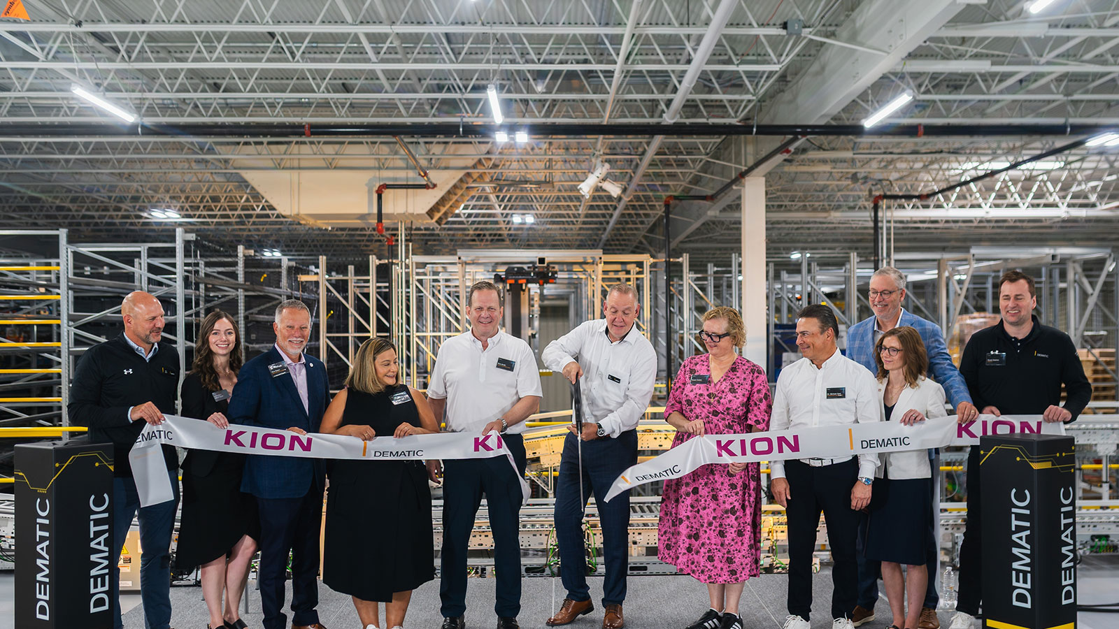 Dematic's official opening of the new Solutions Center in Grand Rapids, Michigan included a ceremonial ribbon-cutting shown here.