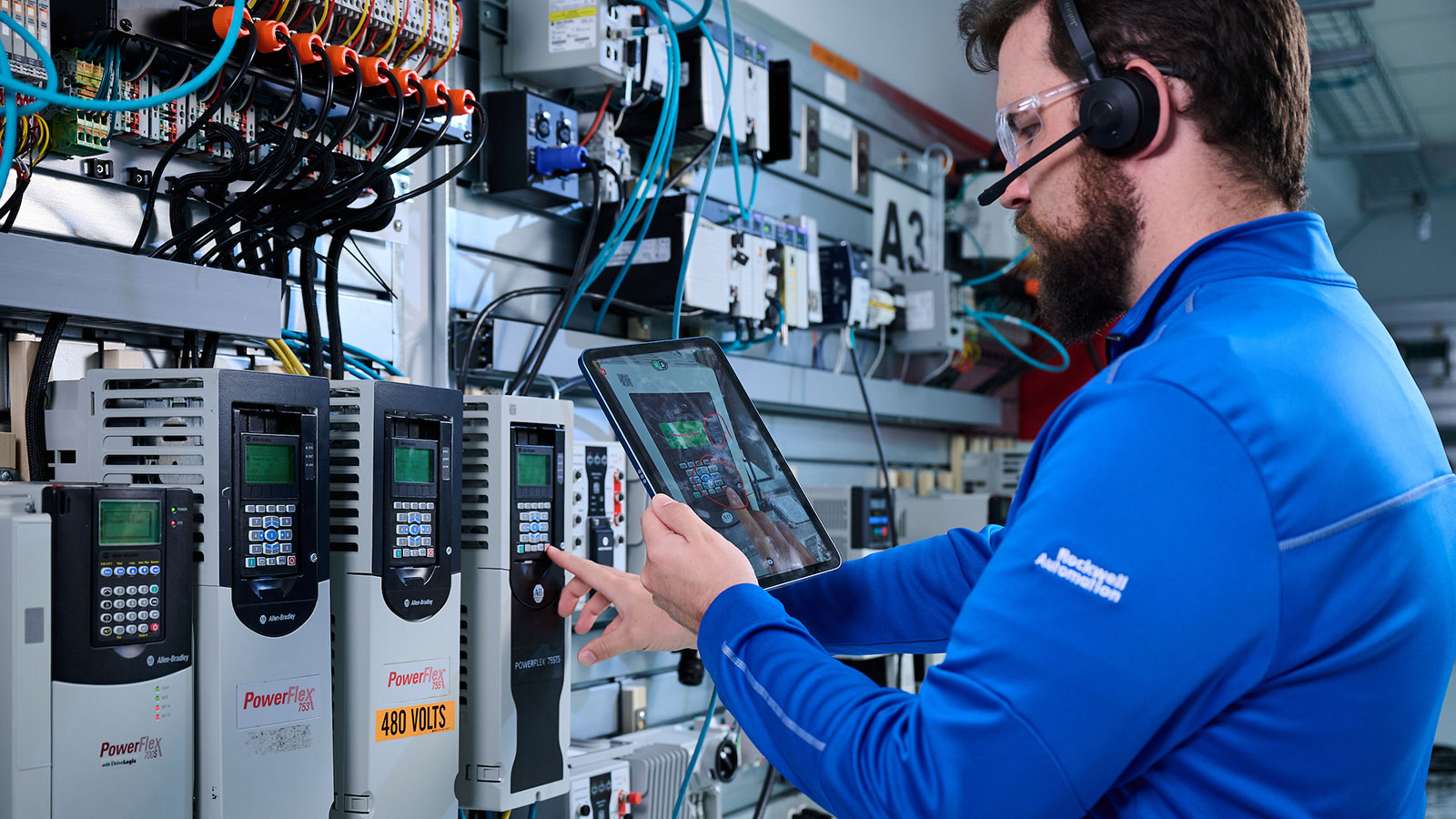 The TechConnectIQ Support platform on a tablet delivers AI-powered troubleshooting guides and real-time expert assistance directly to the plant floor.